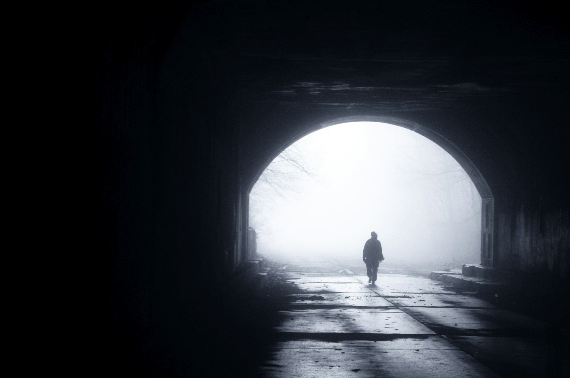 Athlete walking through stadium tunnel